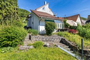 a house with a garden in front of it at Villa Encanto in Albstadt
