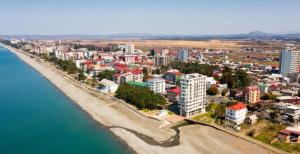 an aerial view of a city next to the ocean at Relax inn in Kobuleti
