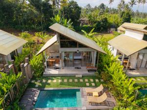 an aerial view of a villa with a swimming pool at Sayuban Villa in Susut
