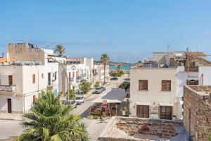 an aerial view of a city street with buildings at Suite Horizon Marine in San Vito lo Capo