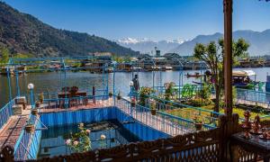 a view from a balcony of a boat on a lake at Luxury Egypt Group of House Boat in Srinagar