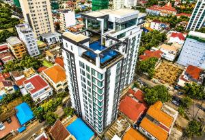 an overhead view of a tall building in a city at Modern and quiet Condo BKK1 - Rooftop Pool in Phnom Penh