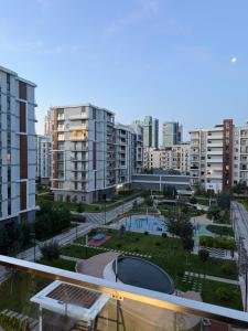 a view of a park in a city with buildings at Top1 Gardens Residents in Tashkent
