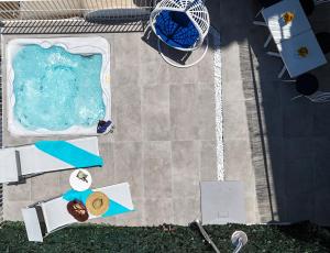 an overhead view of a swimming pool with a volley ball at Dream View Suites Taormina in Taormina