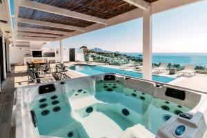 a pool in a house with a view at Cavo Lindos Villas in Lindos