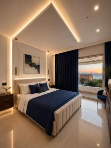a bedroom with a large bed and a large window at IG - "Villa Don Antonio" Apartments in Giardini Naxos +73 photos