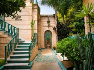 an entrance to a house with stairs and a gate at Sillage Palace Sky & Spa in Marrakesh