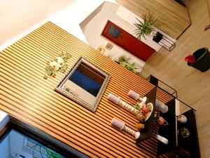 an overhead view of a living room with a television at Casa Naomi in Eforie Nord