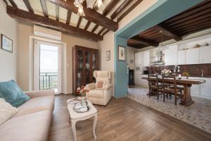 a living room with a couch and a table at Casa Ferdinanda in Monteleone dʼOrvieto
