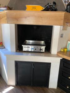 a toy kitchen with a stove in the middle at Villa Jalan in Vrsi