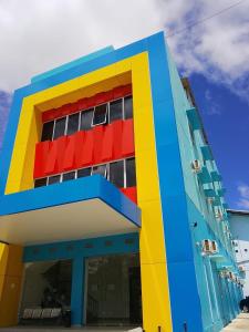 a building painted like a lego building at Priority Teuku Umar Samarinda in Loa Bakong +11 photos