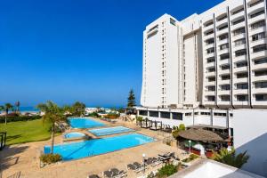 an aerial view of a hotel with a swimming pool at Anezi Tower Hotel in Agadir