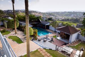 an aerial view of a house with a swimming pool at Poolside View Guest House in Kigali