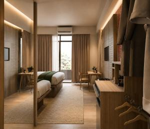 a hotel room with a bed and a desk at Lokai Boutique Hotel in Dumaguete