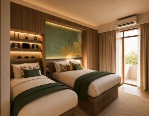 two beds in a room with a window at Lokai Boutique Hotel in Dumaguete