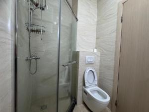 a bathroom with a toilet and a glass shower at Przno in Pržno +26 photos