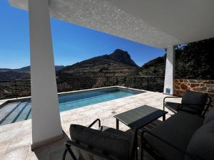 a house with a view of a mountain at Tía Pepa in El Gastor