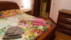 A bed or beds in a room at La Palma