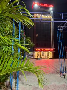 a view of a hotel malawi city at night at Hotel Nalanda City in Nalanda