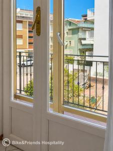 a window with a view of a balcony at CASA BETTI in Pesaro