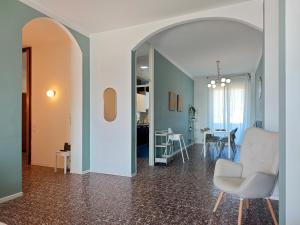 a living room with a chair and a table at Star Lake in Intra