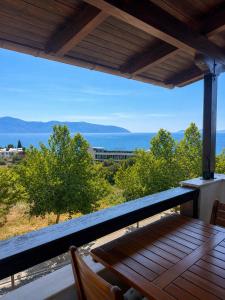 a view of the ocean from the balcony of a house at Villa Hodo in Vlorë