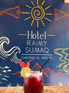 a drink on a table with a sign that reads hotel rainy mimosa at Raimy Sumaq in Arenillas