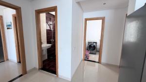 a bathroom with a toilet and a sink and a mirror at Le paradis 210 in Kelibia +47 photos