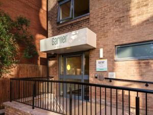 a building with a sign that reads gemmer at Garner Hotel Wolverhampton by IHG in Wolverhampton
