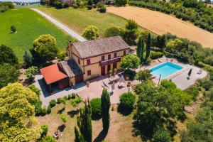 an aerial view of a house with a swimming pool at Italian Experience-Casa Bellavista in Ostra
