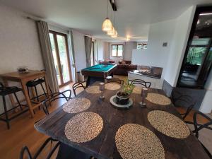 a living room with a table and ping pong ball at Villa VIP in Welkenraedt