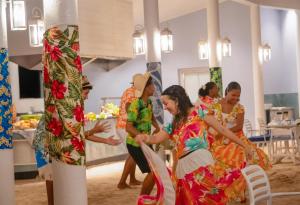 a group of women standing in a room at Paradise Sun Hotel Seychelles in Baie Sainte Anne +132 photos