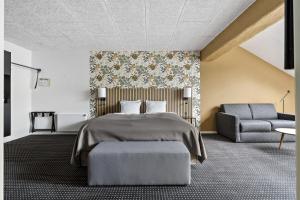 En eller flere senge i et værelse på Hotel Dalgas, BW Signature Collection + 79 billeder