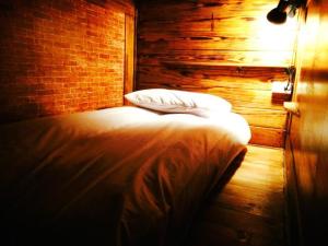 Postel nebo postele na pokoji v ubytování 33 Backpacker