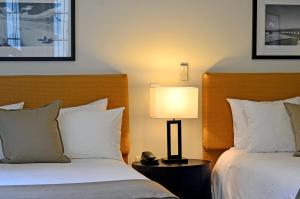 Postel nebo postele na pokoji v ubytování Hotel St. Michel