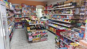 a store aisle of a store with lots of products at Pension Rainbow*** in Karlovy Vary