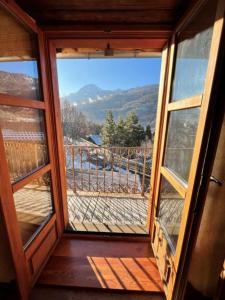a view from the window of a house at 130 sqm Apartment in a Village House in La Salle-les-Alpes