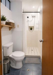 a bathroom with a toilet and a shower at MyAbancayHome in Abancay