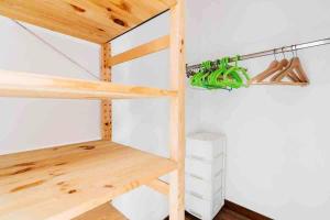 a loft bed in a room with a ladder at SalentoTraTerraMare in Diso