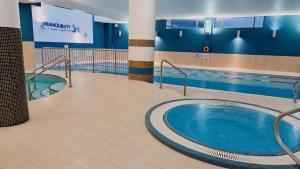 a jacuzzi tub in a swimming pool at Raheen Woods Hotel in Athenry