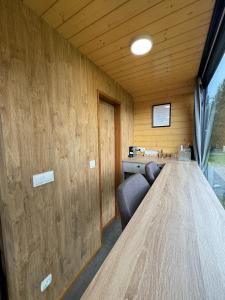a conference room with a long table and chairs at Tatry Panorama House in Zuberec