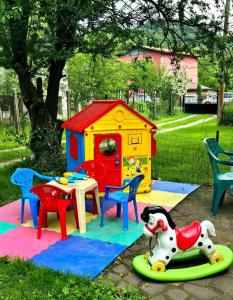 a play set with a table and a toy dog at Villa Ribarica in Ribarica