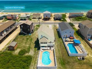 an aerial view of a beach house with a swimming pool at 4073 - Downtime in Kitty Hawk