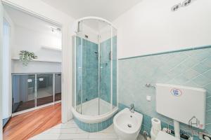 a bathroom with a shower and a toilet in it at SeaSoul - Mare 100m - 6 Guests - Centro Storico in Albissola Marina