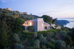 an aerial view of a house on a hill at Atrium Villas in Kechria