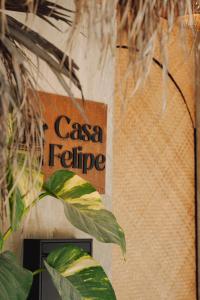 a sign on a wall that says casa refuge at Casa Felipe in General Luna