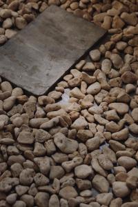 a bunch of rocks on the ground at Casa Felipe in General Luna +9 photos