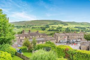 an aerial view of a village in the hills at 3 Bed in Hawes oc-ds967 in Hawes