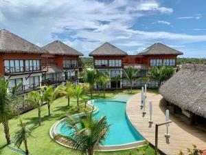 an aerial view of a resort with a swimming pool at Villas BobZ in Barrinha