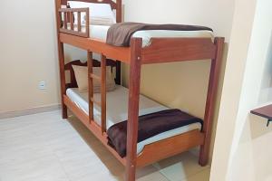 a couple of bunk beds in a room at Casa Marajoara in Soure